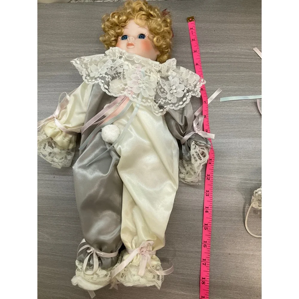 VINTAGE PORCELAIN DOLL IN CLOWN COSTUME